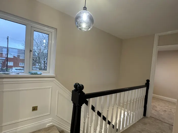 Landing and stairwell by Cann's Electrical, Cardiff